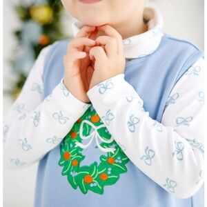 TBBC Tatum’s turtleneck blue bows